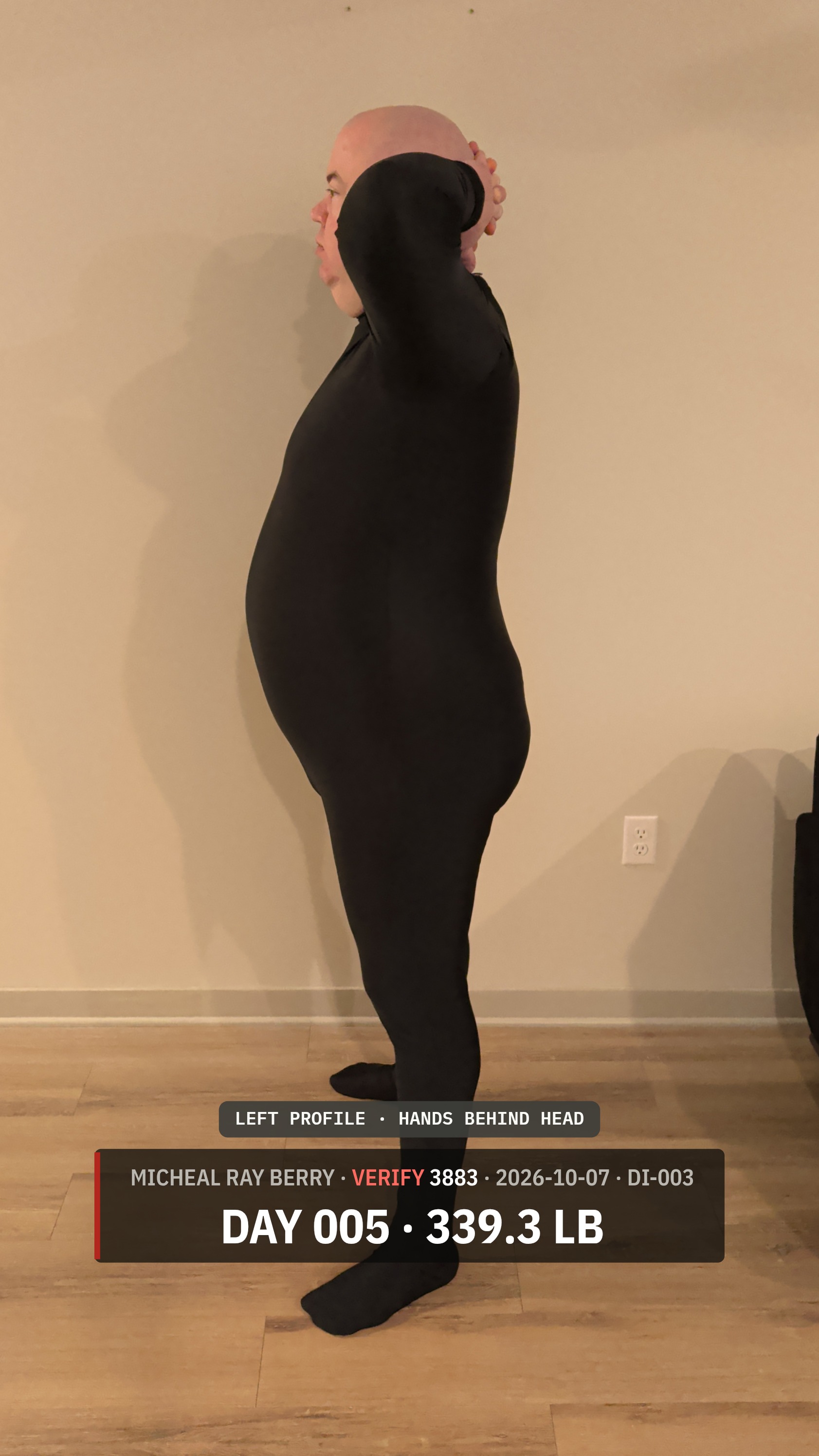 Micheal Ray Berry left-side view accountability photograph on October 7, 2026, Day 5, at 339.3 pounds
